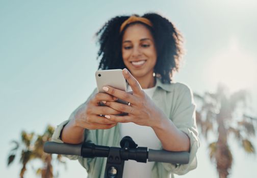 Phone, scooter and black woman with technology in city for social media, texting or internet browsing. Travel, communication and hands of female with electric moped and 5g smartphone for networking