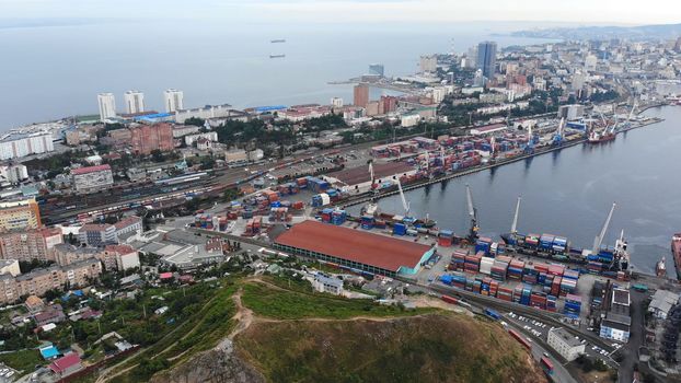 Top view. Vladivostok Commercial Sea Port. Industrial port with containers in Vladivostok.