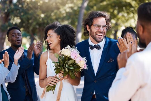 Wedding crowd and applause to celebrate couple with happy, excited and cheerful smile. Interracial love and happiness of bride and groom at marriage event together with guests clapping.