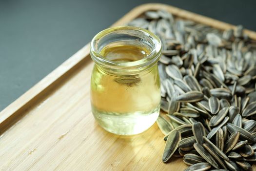 sunflower oil seed and oil in a container on table
