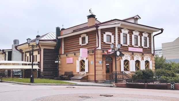 Irkutsk, Russia - August 21 , 2021: 130 Kvartal quarter Irkutsk Sloboda is a specially created area of historic buildings in the center of Irkutsk, Russia.