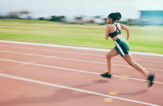 Black woman, running and athletics for sports training, cross fit or exercise on stadium track in the outdoors. African American female runner athlete in fitness, sport or run for practice workout