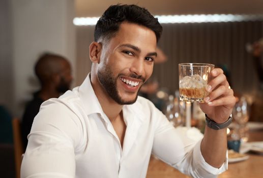 Man, whiskey glass or toast in night party, luxury dinner event or Portugal New Year celebration in friends social gathering. Portrait, smile or happy person with alcohol or restaurant cocktail drink.