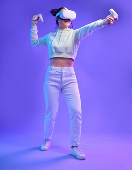Virtual reality headset, metaverse fight and a woman with vr controller for futuristic gaming. Gamer person with hand for ar world, digital experience and 3d cyberpunk purple background app mockup