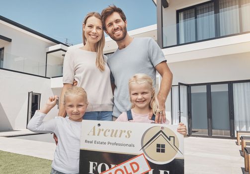Real estate, sold and portrait of family with sign after buying property and homeowner advertising. Happy, showing and parents with children, board and beginning relocation to new home from realtor