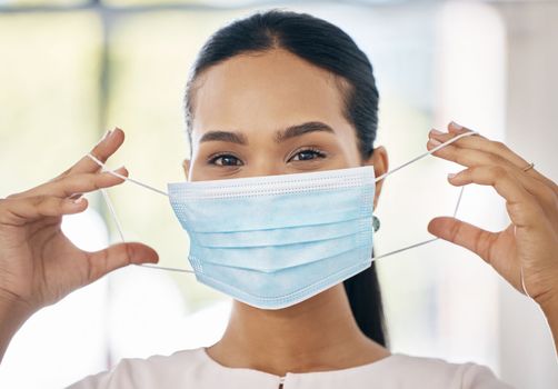 Face mask, woman and covid healthcare for medical protection, professional safety and covid 19 pandemic vaccine center. Healthcare, a worker with mask and clinic at coronavirus virus treatment clinic