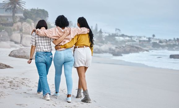 Beach, hug or friends walking to relax on holiday vacation while talking or bonding in nature together. Back view, trust or group of women relaxing at sea enjoy traveling on fun ocean trips in Miami