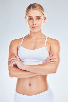 Health, fitness and beauty of woman in studio for exercise, workout and diet motivation for a healthy, fit and slim body in studio. Portrait of model posing for skincare, wellness and self care