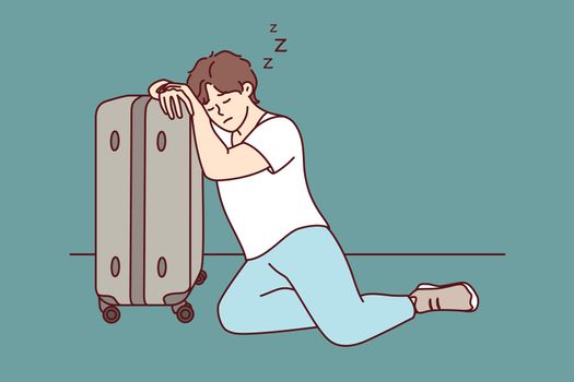 Tired man sleeps resting head on travel suitcase after difficult business trip. Vector image