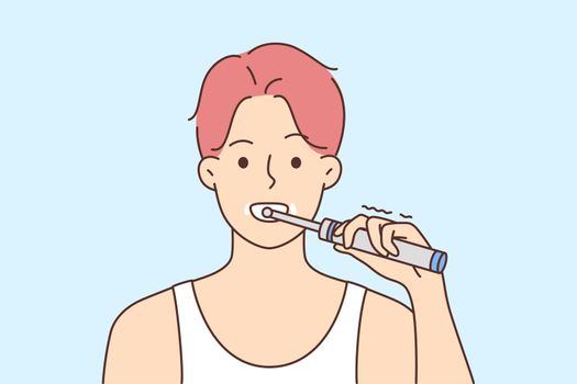 Young man brush teeth with toothbrush