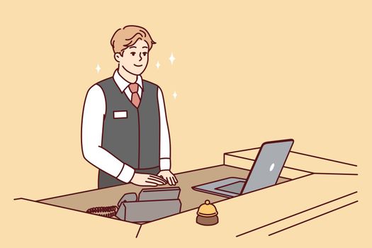 Man working as receptionist in hotel stands behind counter with laptop and phone. Vector image