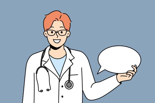 Smiling doctor with speech bubble