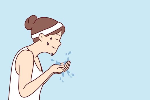 Sweaty woman with headband holds water in palms wanting to wash after fitness. Vector image