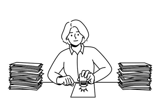 Woman work at desk with documents