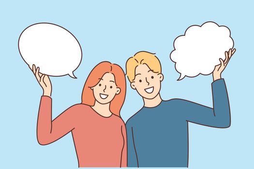 Smiling people with speech bubbles make advertising or promotion. Happy man and woman with talk balloons show good deal or discount. Vector illustration.