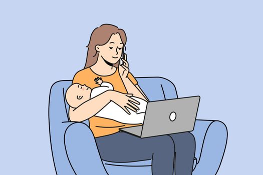 Young mother with newborn work on laptop