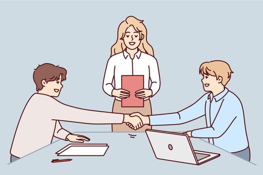 Men hand shake close deal at meeting