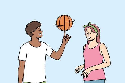 Happy multiracial friends have fun playing basketball outdoors. Smiling man and woman enjoy game on playground. Hobby and entertainment. Vector illustration.