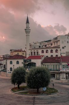 Mosque at sunrise with pink sky