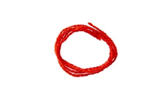 Red thread isolate on white background. Selective focus.