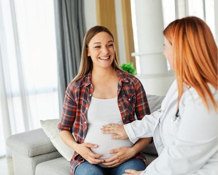 woman pregnant mother pregnancy female belly doctor patient visit maternity motherhood care medicine hospita medical clinic gynecologist consultation