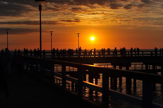 sunset on the pier in Palanga, Baltic sea