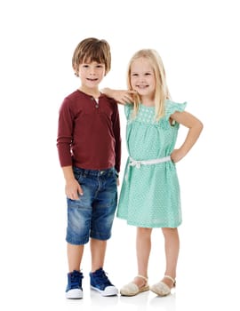 What mischief can we get up to today. Studio shot of a cute little boy and girl posing together against a white background.