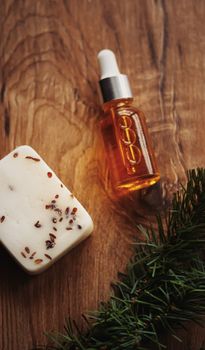 Oil serum bottle and natural herbal handmade soap, beauty and skincare product