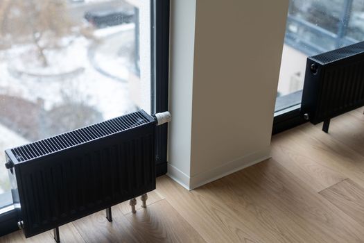 Cast iron radiator heater for home. Black heating battery
