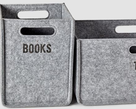 Gray felt box with handles and lettering for storing books