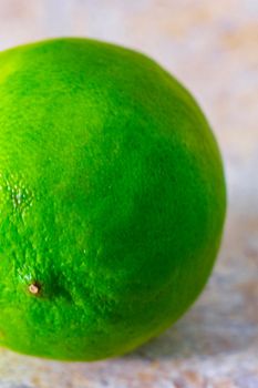 Green ripe lime lime citrus fruit on the table in Mexico.