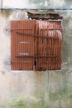 Old broken wooden shutter 