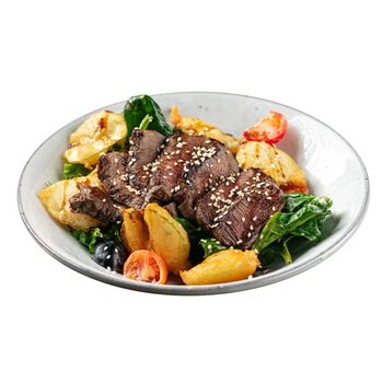 Roast beef dish with vegetables garnish