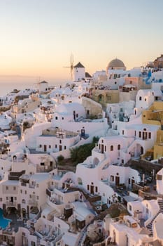 Oia Santorini Greece in the evening during sunset, traditional Greek village