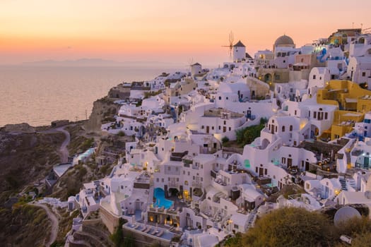 Sunset at the Greek village of Oia Santorini Greece with a view over the ocean caldera