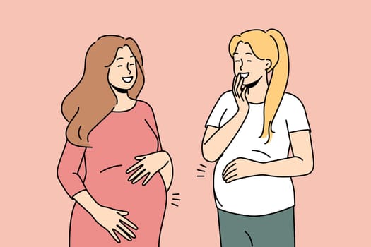 Smiling pregnant women with big bellies