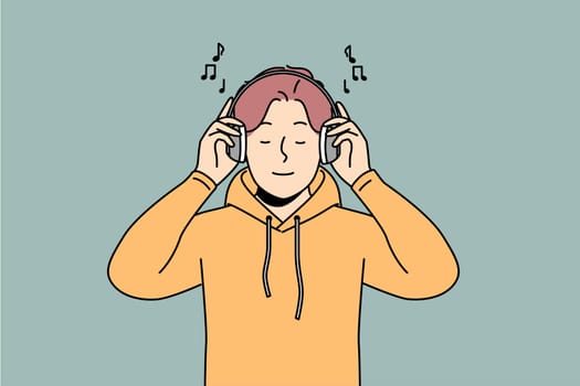 Happy man listen to music in earphones