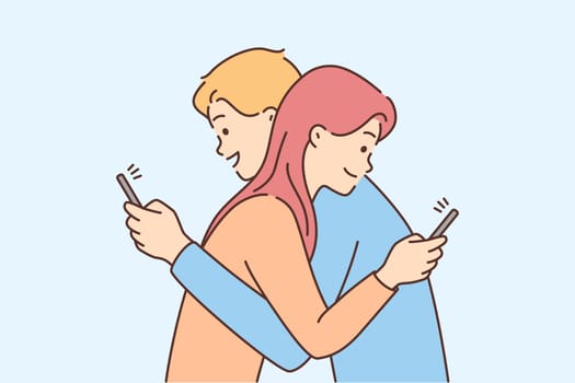 Couple hug using cellphone