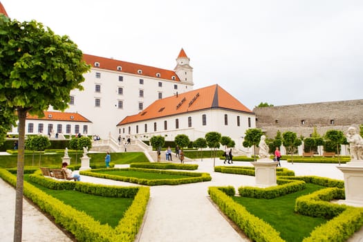 The courtyard garden of the baroque castle of Bratislava. The castle stands on an isolated rocky hill directly above the Danube River in the center of Bratislava, Slovakia.