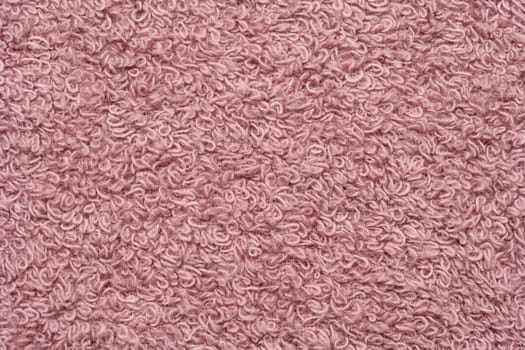 Texture of pink terry cotton towel, canvas. Macro