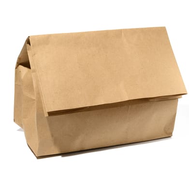Full brown paper bag on a white background