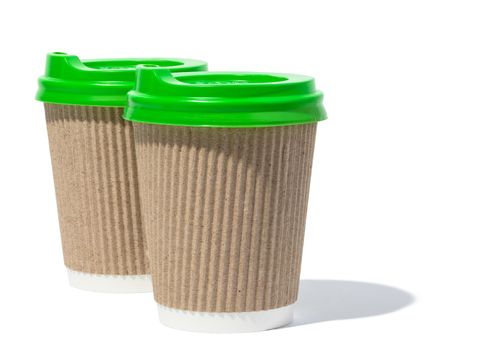 Empty brown paper disposable cups on a white background, concept eco-friendly, zero waste 