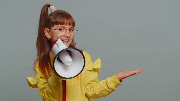 Toddler girl scream shout in megaphone loudspeaker announces discounts sale announcing advertisement