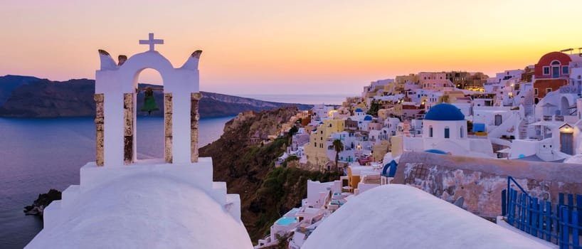 Sunset at the Greek village of Oia Santorini Greece with a view over the ocean caldera
