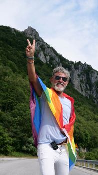 Senior man Gay gray-haired with LGBT flag