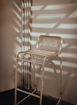 The stand alone chair is affected by Sunbeam shine through in the morning. 