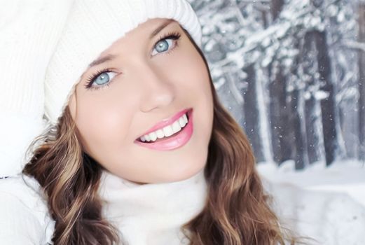Winter holiday travel, lifestyle and fashion, beautiful happy woman and snowy forest, nature, ski resort and leisure activity outdoors Christmas, New Year and holidays portrait