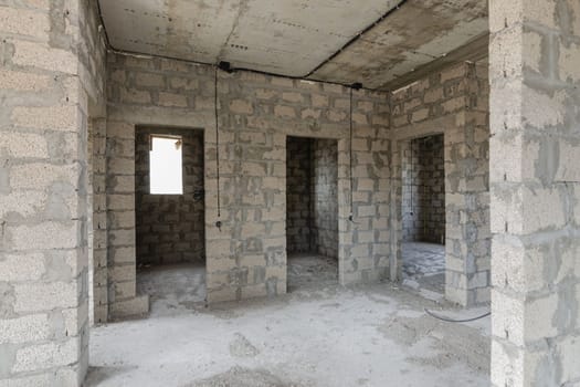 Construction of an individual residential building, view of the doorways to the bathrooms and rooms