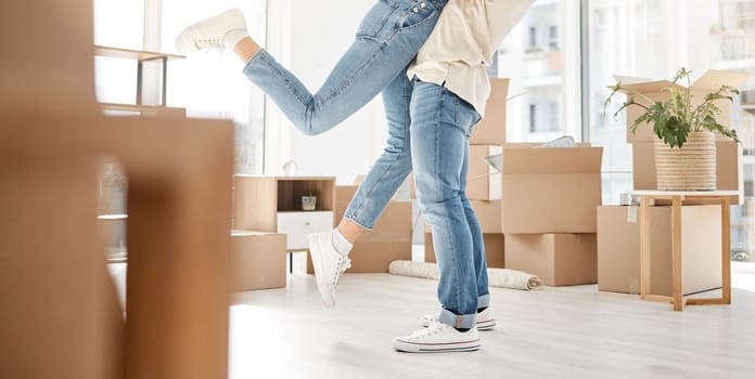 Overjoyed with the moment of becoming homeowners. Closeup shot of an unrecognisable couple celebrating the move into their new home.