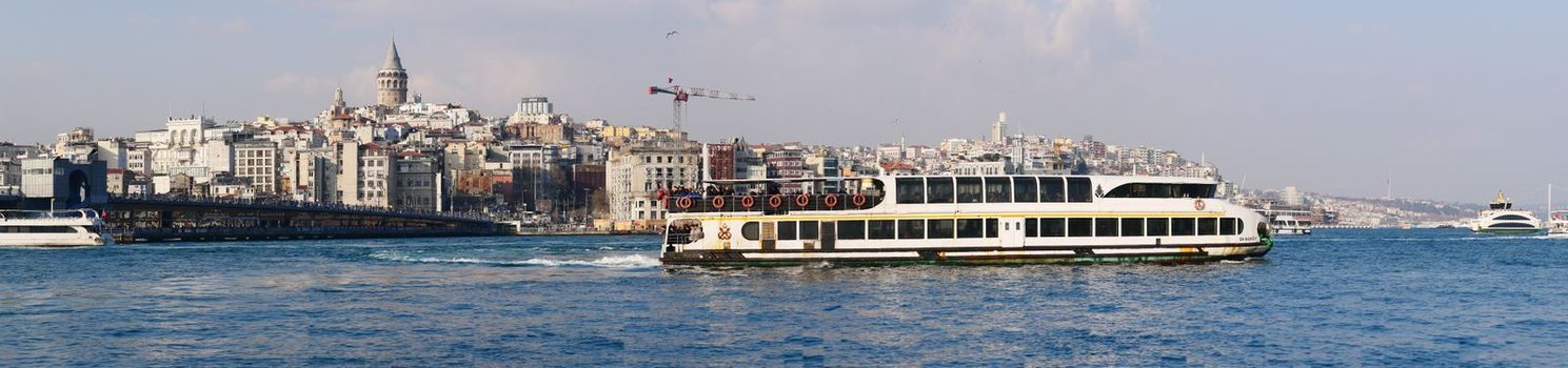 Istanbul cityscape, ferries in a cloudy day
